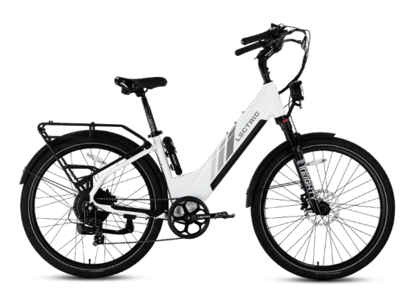 A white electric bicycle with black accents, upright handlebars, front and rear fenders, rear cargo rack, and thick tires, shown from the side against a plain background.