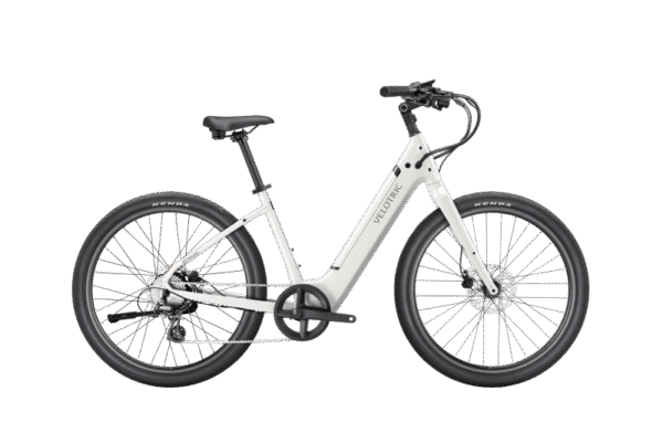 A white step-through electric bicycle with black tires, a rear derailleur, and an upright handlebar, photographed on a plain white background.
