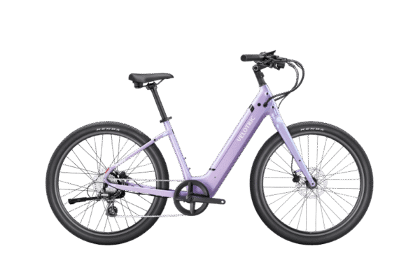 A lavender-colored step-through electric bicycle with black tires, a black seat, and upright handlebars, shown from the side on a white background.