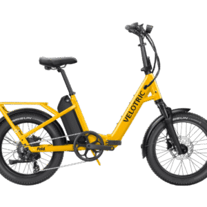 A yellow Velotric foldable electric bike with black tires, a rear rack, and a step-through frame, shown from the side on a white background.